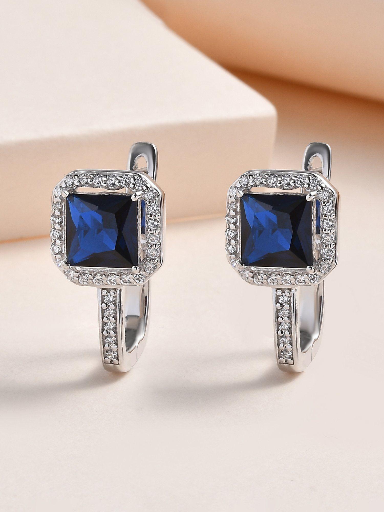 blue sapphire omega back earrings in pure silver