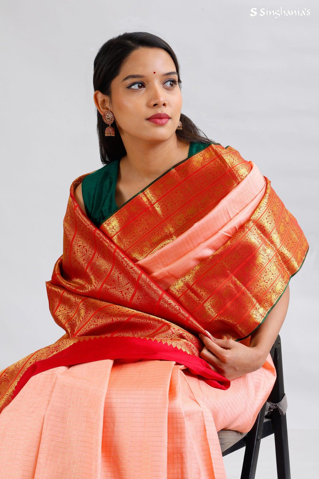 blush peach kanjivaram silk saree with stripes pattern