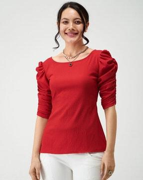 boat-neck top with puff sleeves