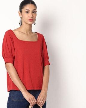 boat-neck top with puffed sleeves