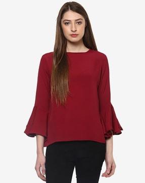 boat-neck top with ruffled sleeves