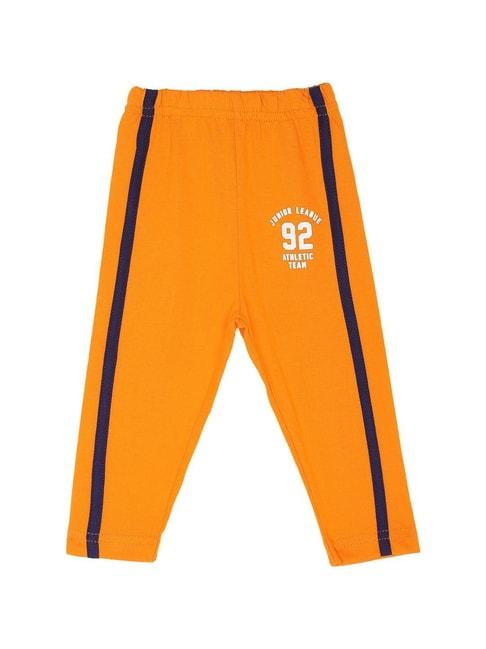bodycare kids orange printed trackpants