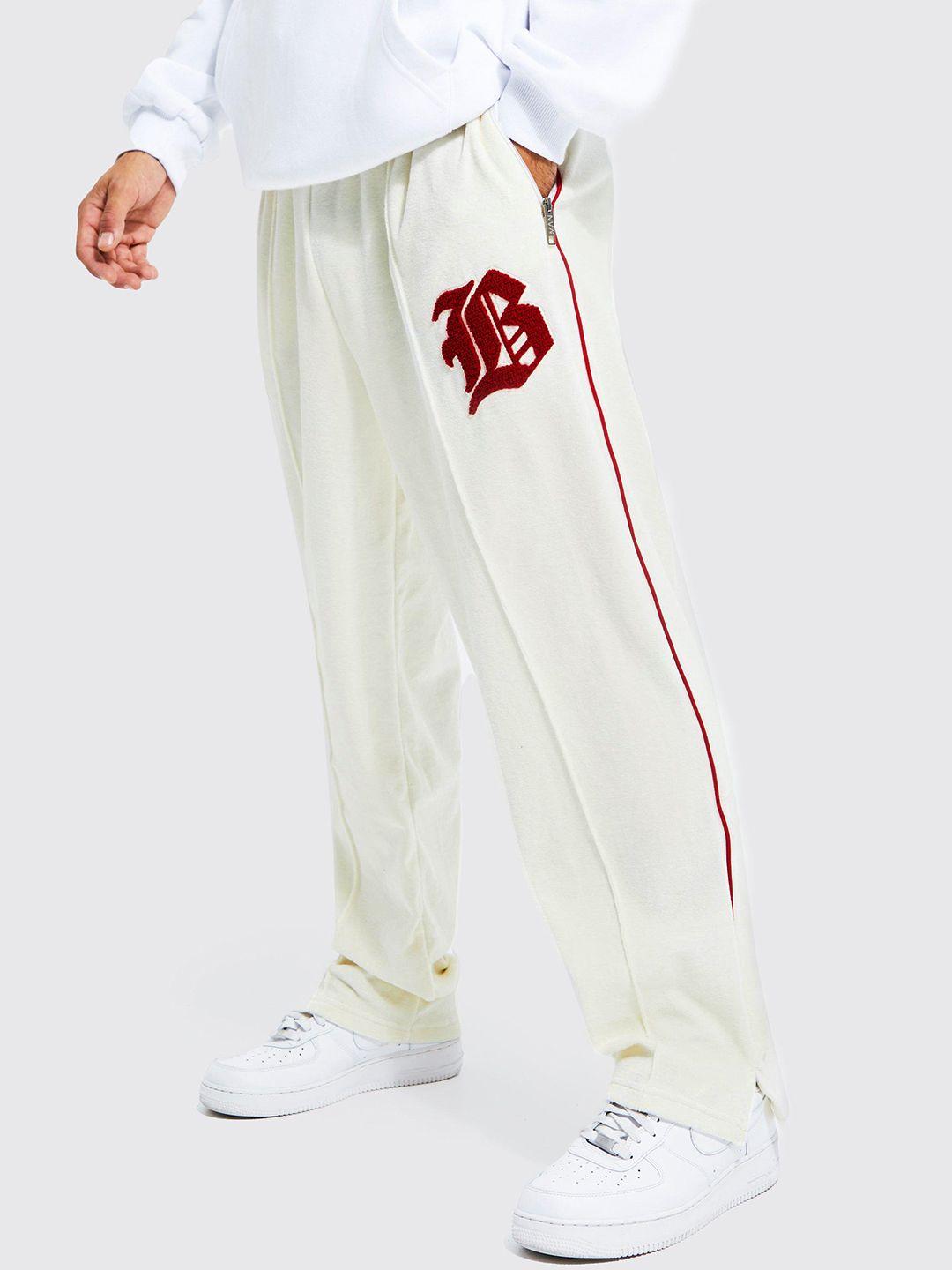 boohooman wide fit varsity printed fleece track pants