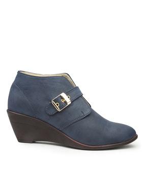 bootie with buckle closure