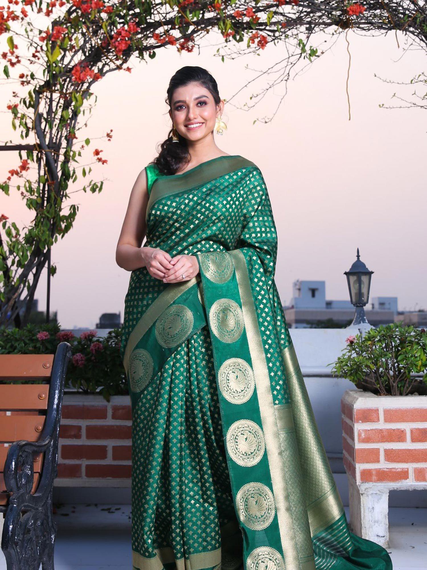 bottle green brocade silk saree with traditional motif and unstitched blouse