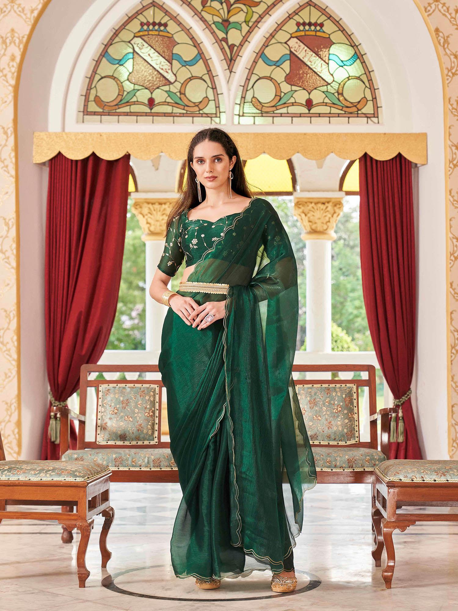 bottle green colored satin embroidered & scalloped border saree with unstitched blouse