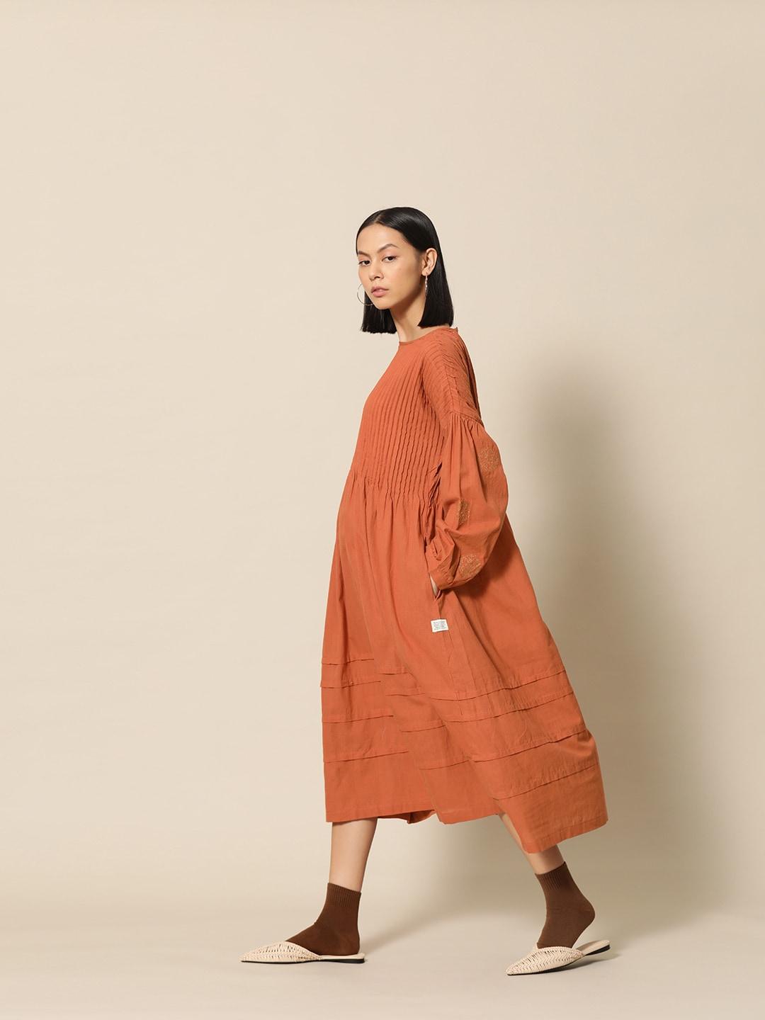 bower rust orange solid pure cotton puff sleeves a-line midi dress with embroidered detail