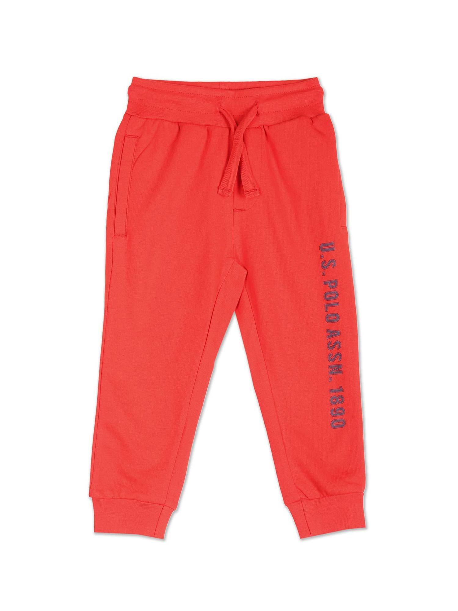 boys red brand print mid rise joggers