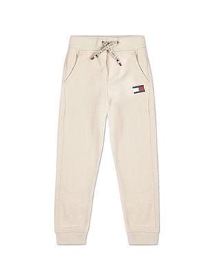 boys beige mid rise flag print joggers