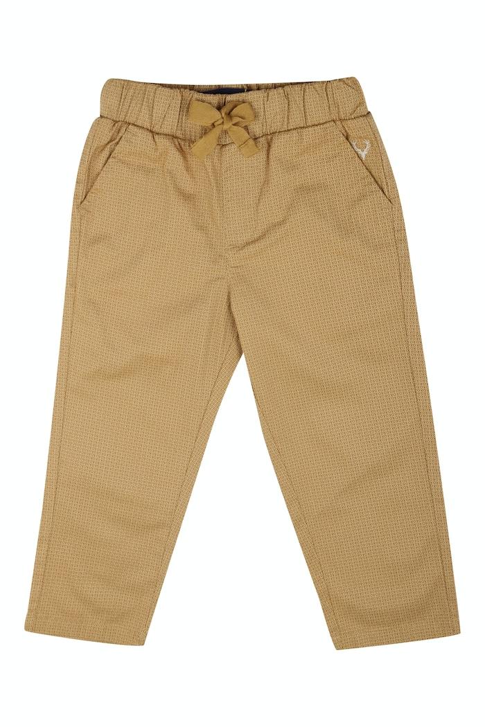 boys brown slim fit print trousers