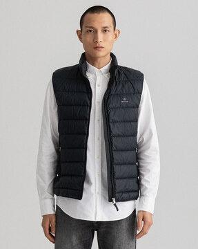 brand print quilted gillet with zip front closure