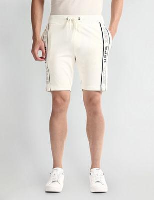 brand taped slim fit shorts