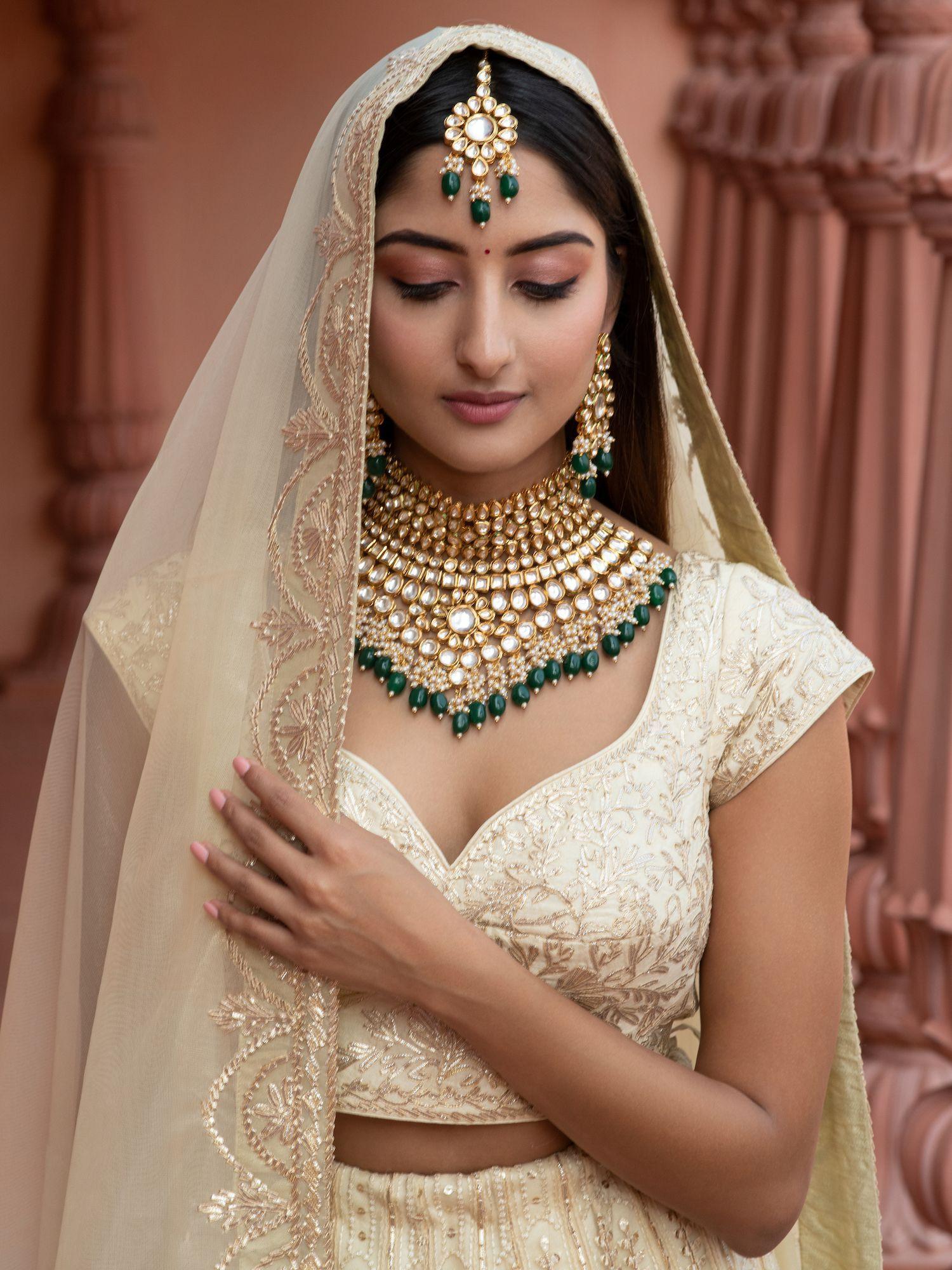 bridal kundan and green stones high neck choker set