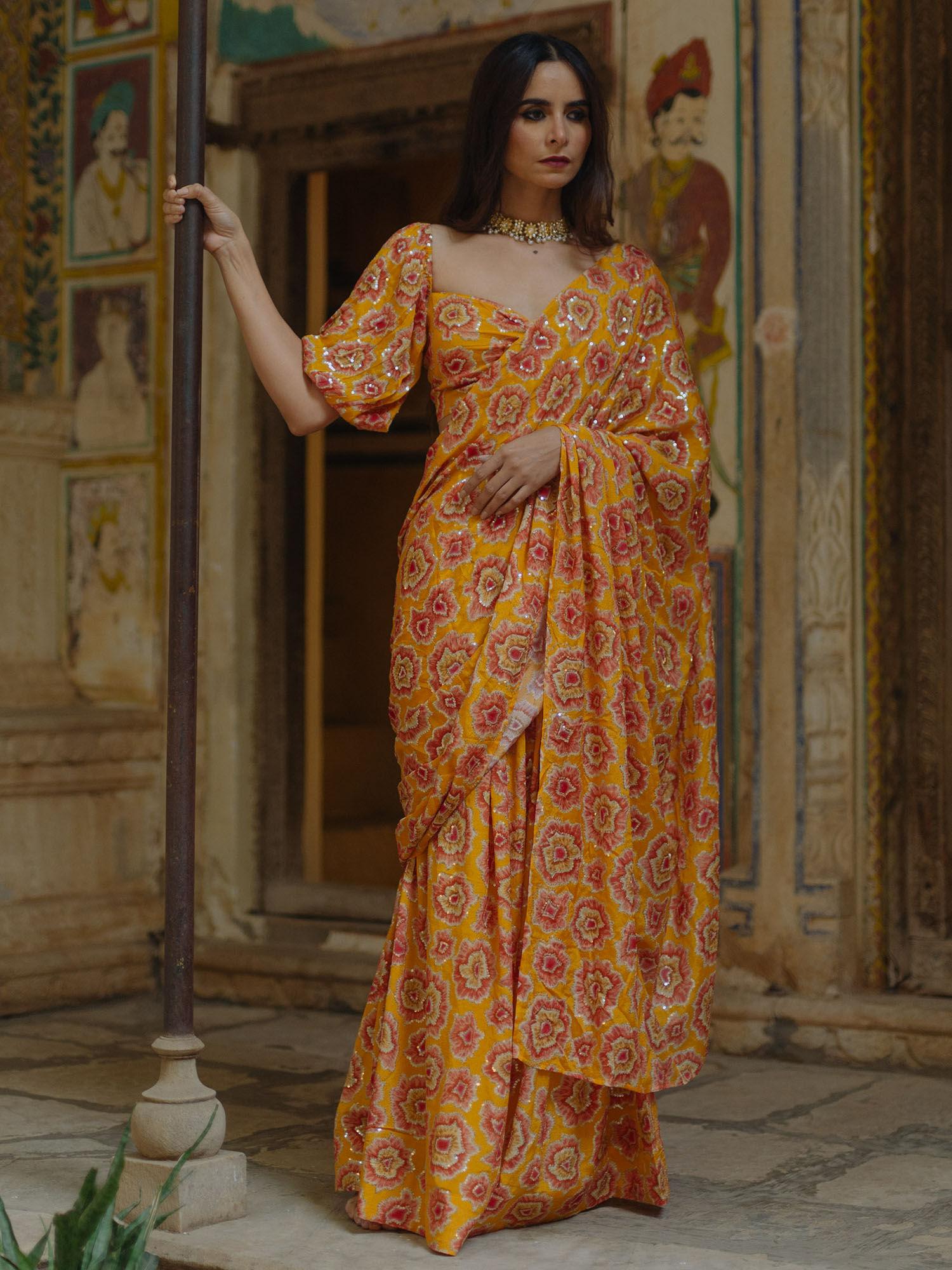 bright mustard embellished draped saree with stitched blouse