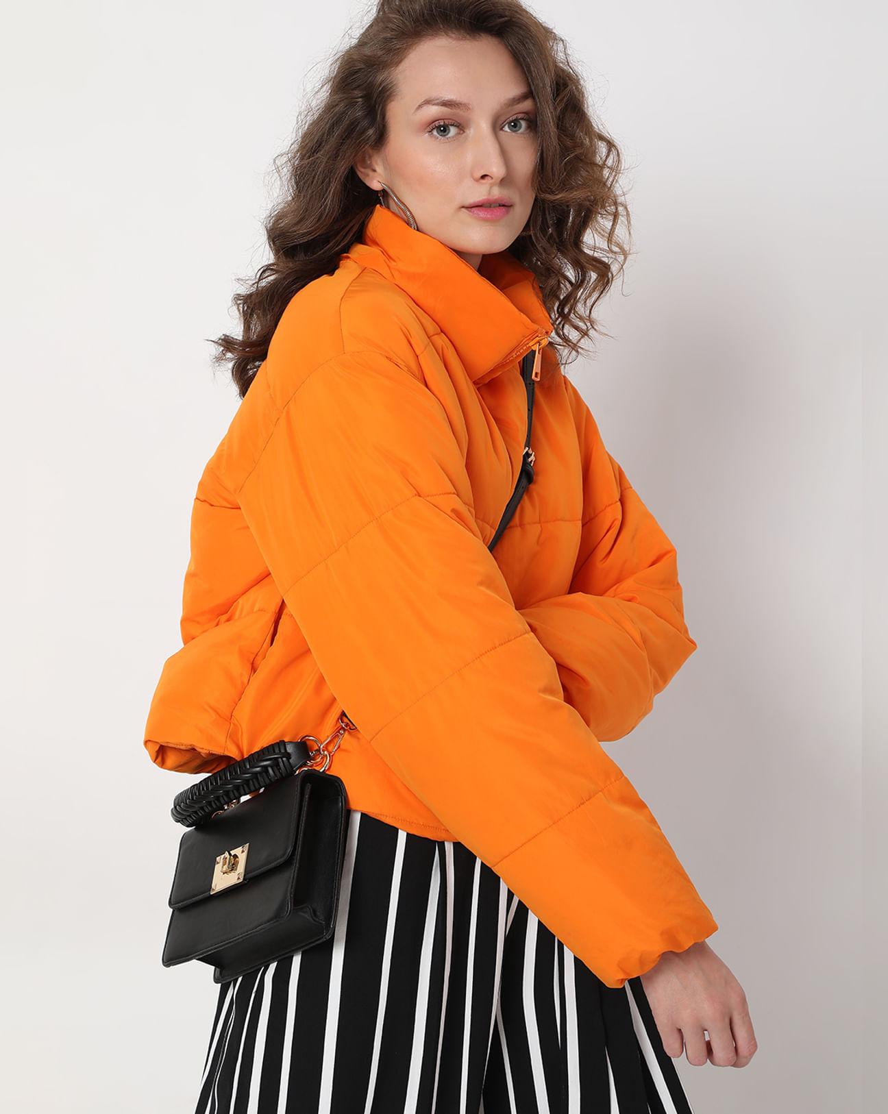 bright orange puffer jacket