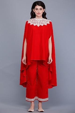 bright red embroidered oversized circular cape