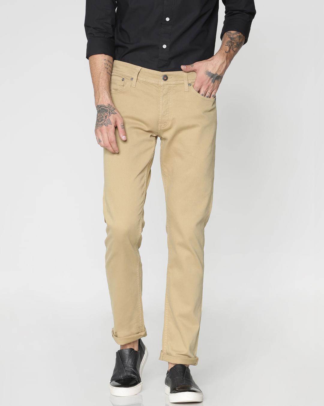 brown low rise over dyed slim fit pants