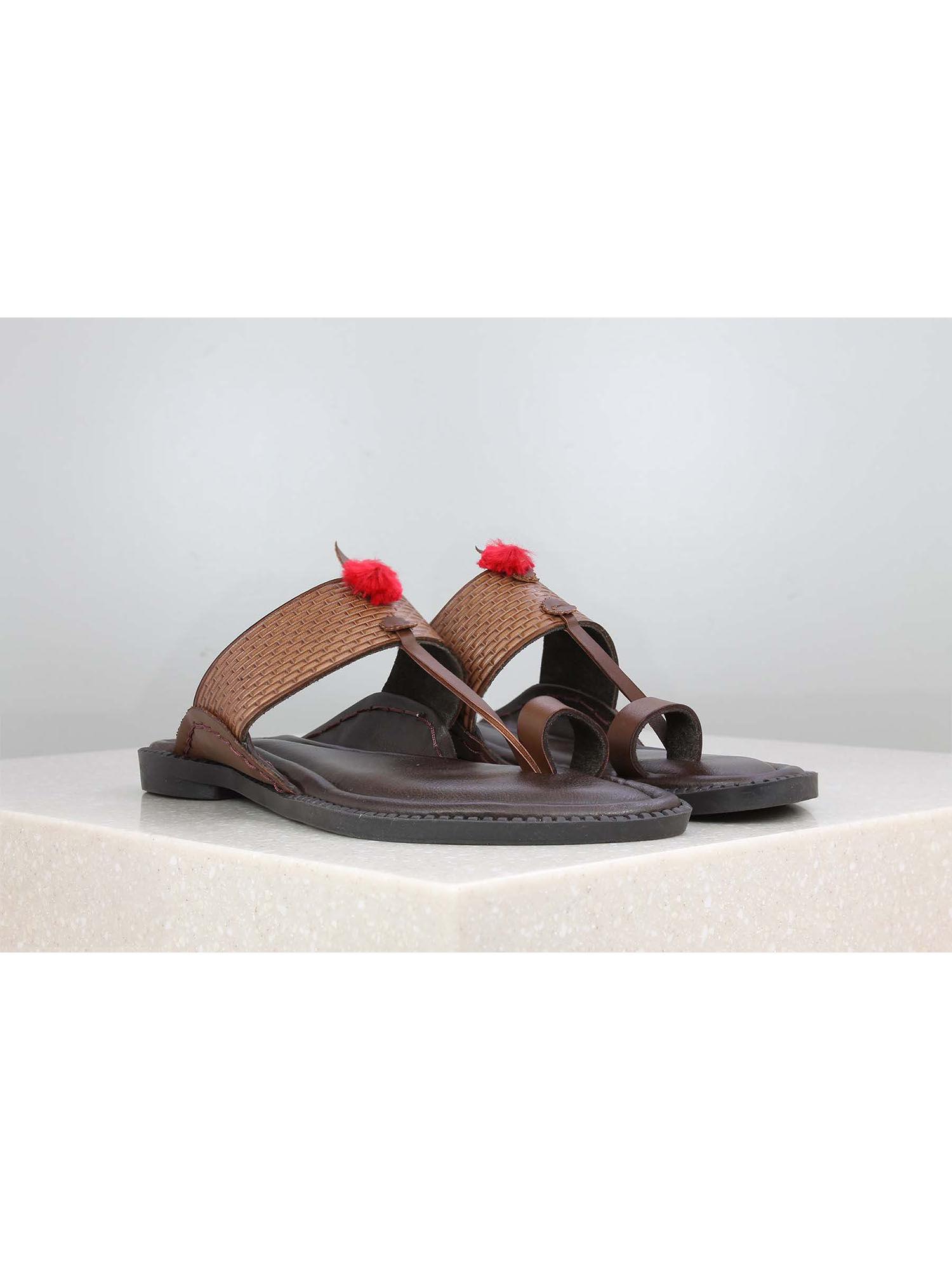 brown self design flip flops