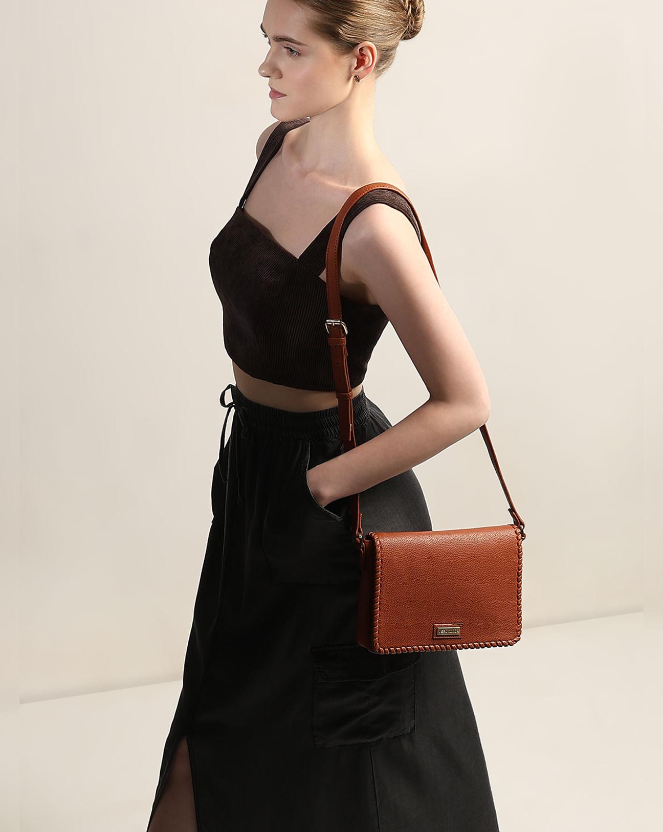 brown sling bag