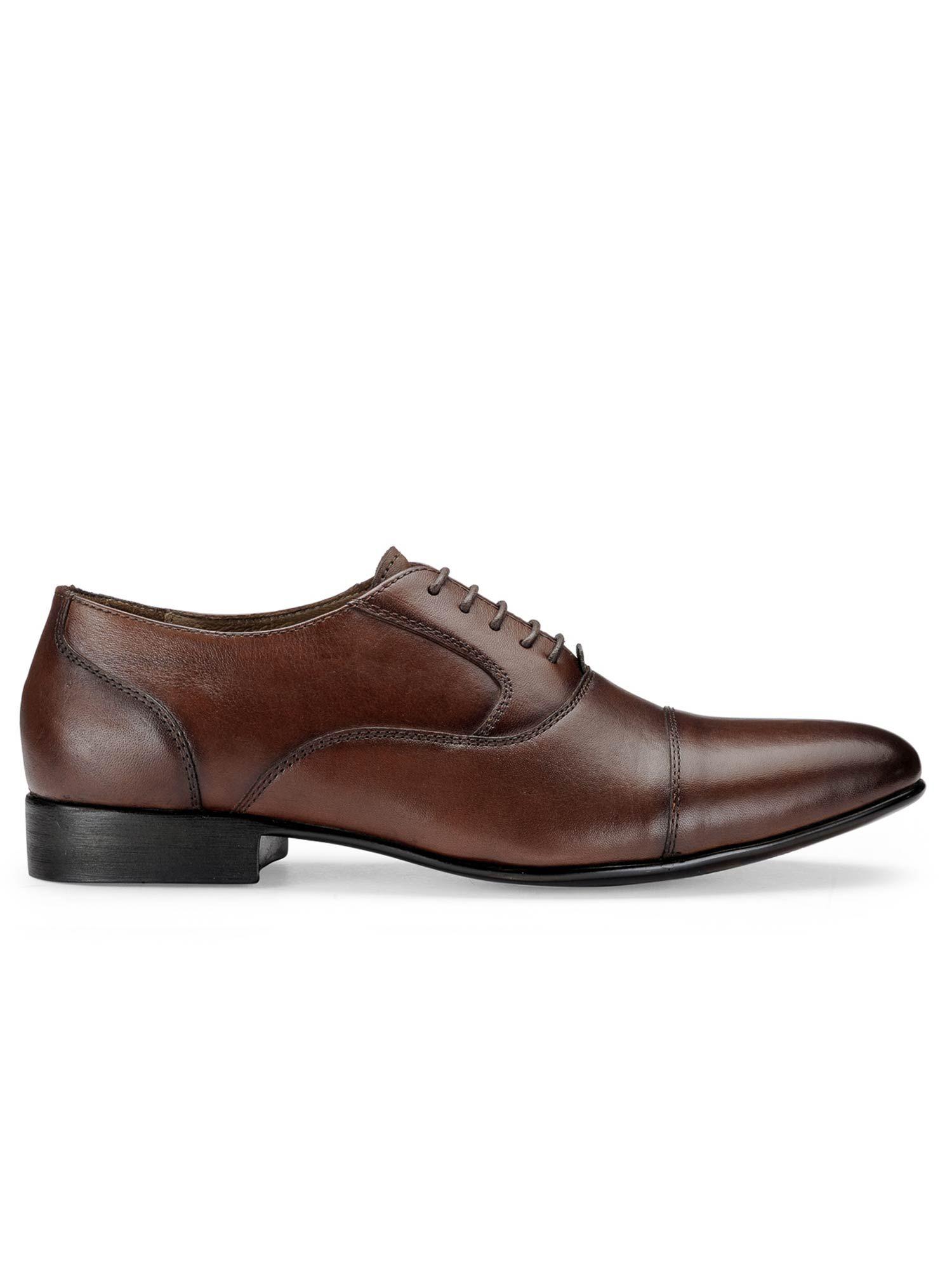 brown solid brogues