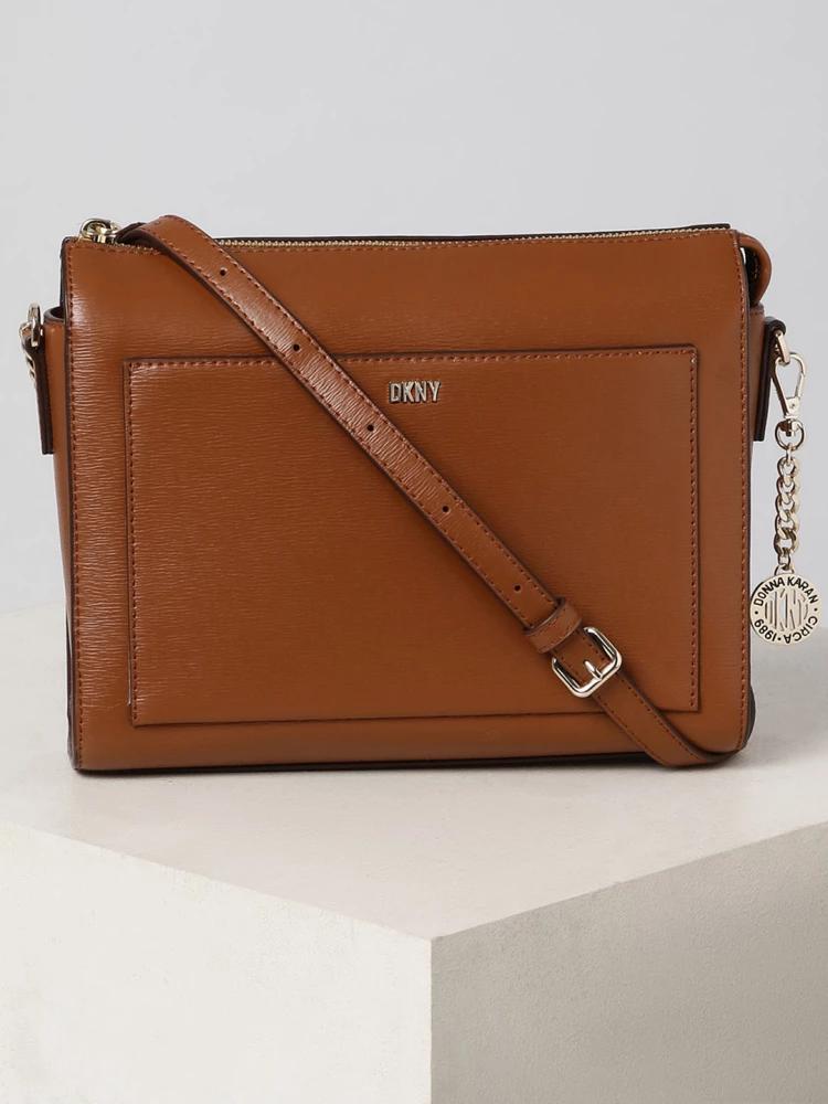 brown sutton textured crossbody bag