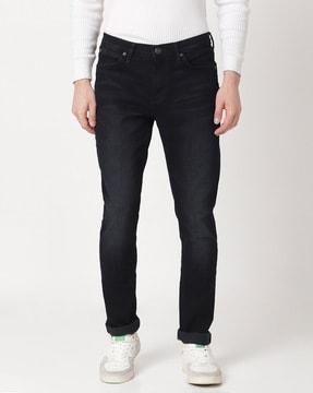 bruce skinny fit mid-wash jeans