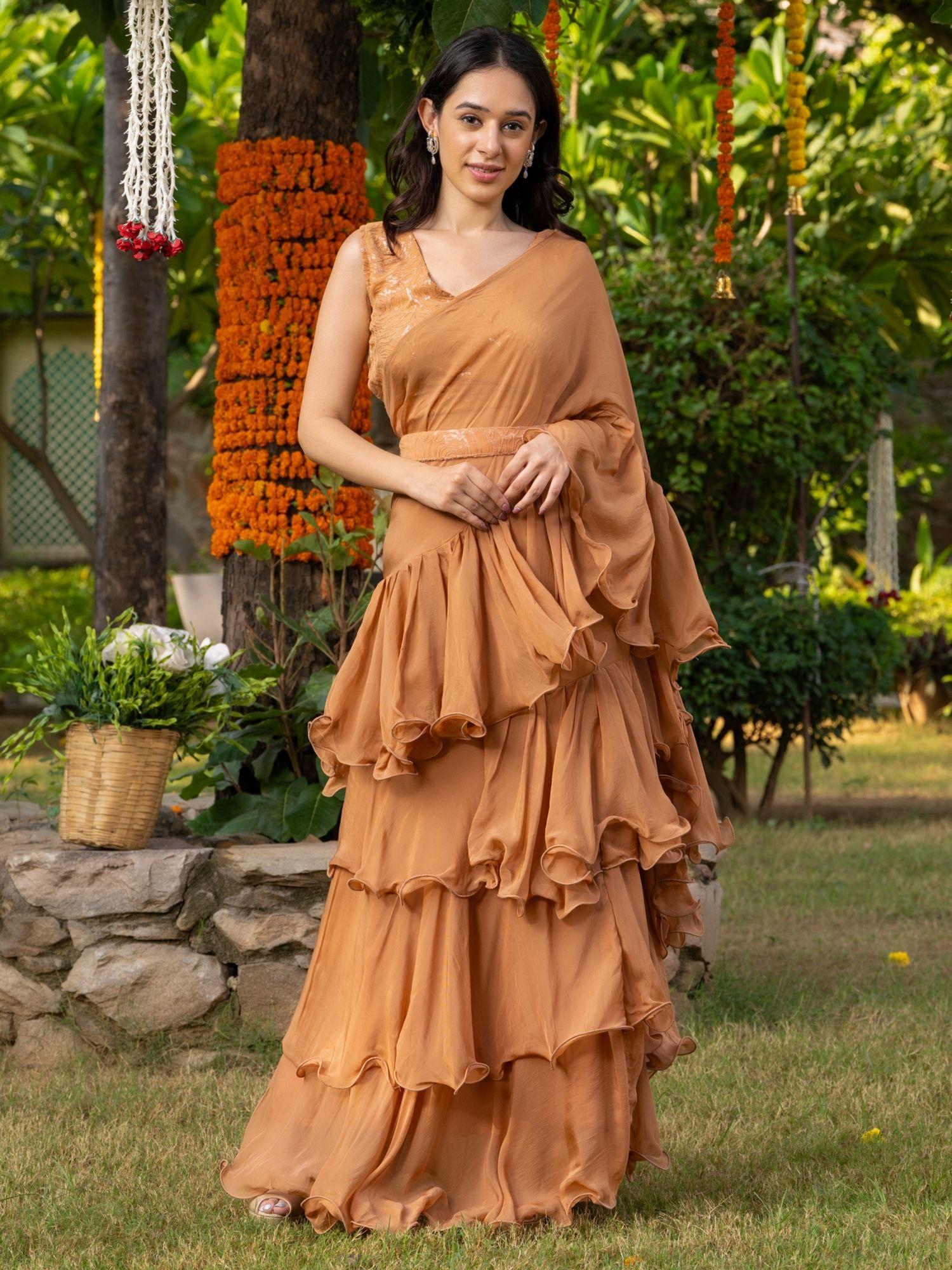 buff brown ruffle saree with stitched blouse