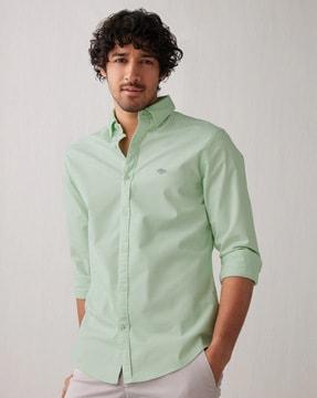 button-down collar shirt with curved hem