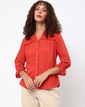 button-down top with ruffled trim