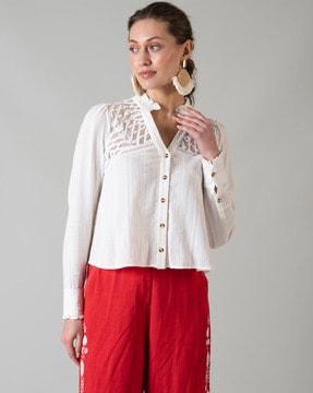 button-down top with sheer lace detail