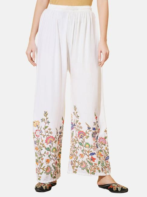 buynewtrend white embroidered palazzos