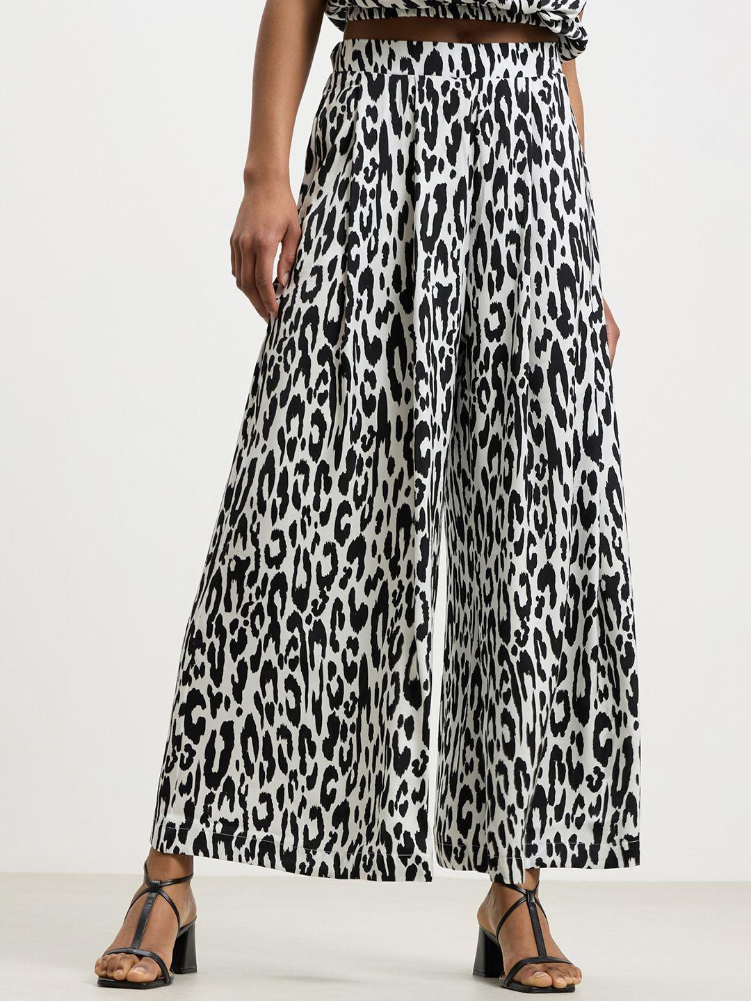 calliope women animal printed flared trousers