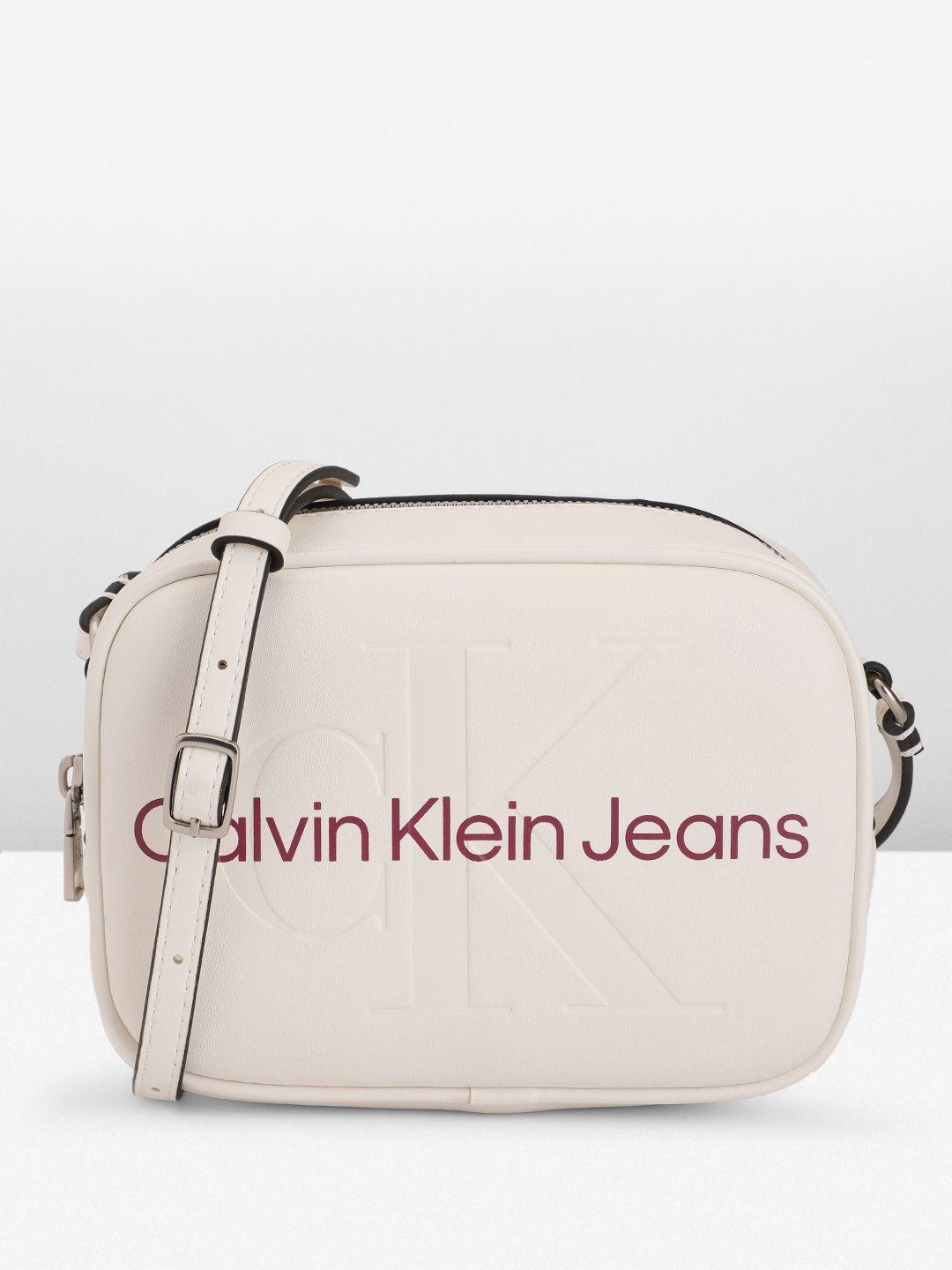 calvin klein brand logo printed & debossed structured sling bag