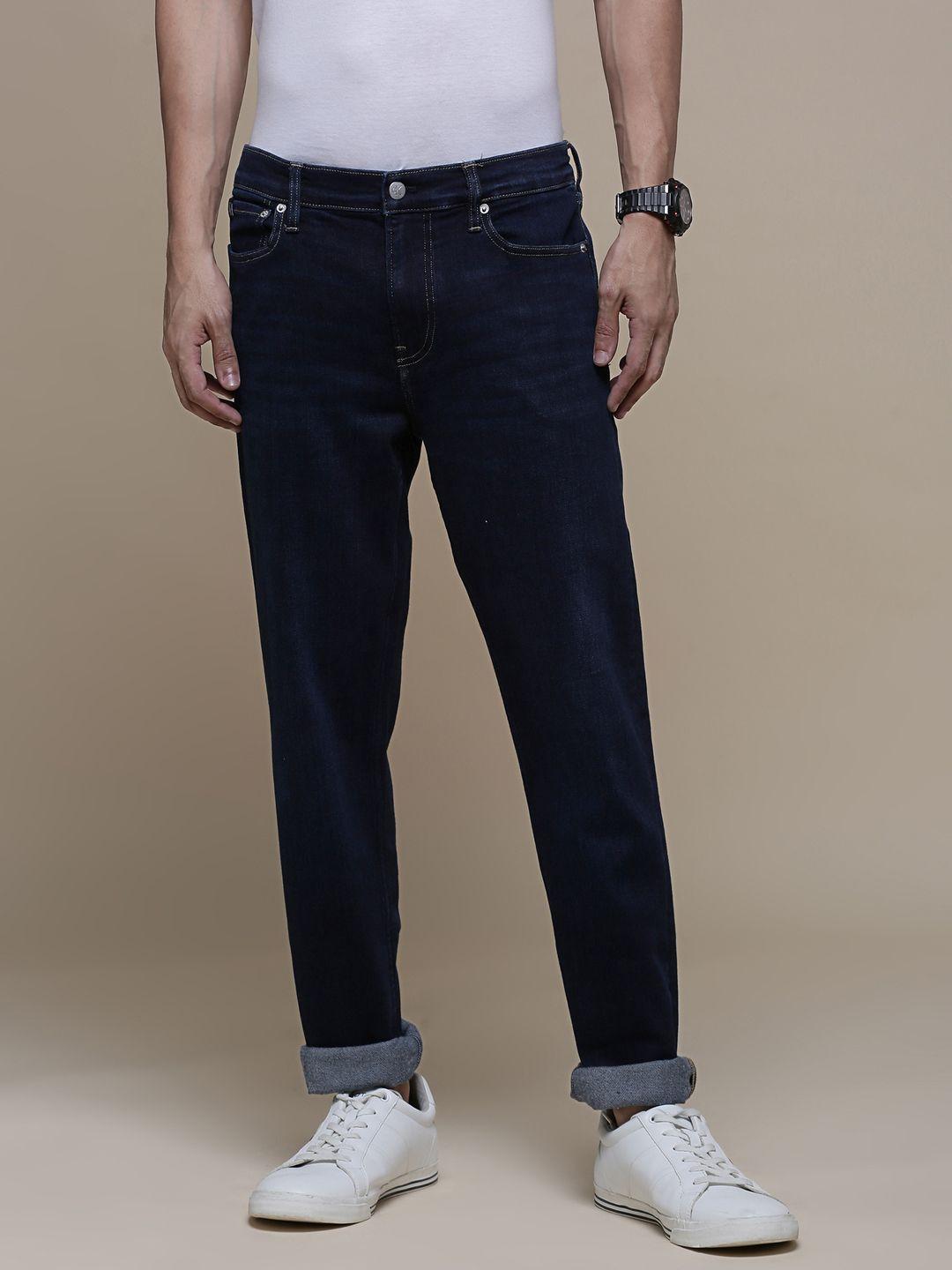 calvin klein jeans men blue slim fit light fade mid-rise stretchable jeans