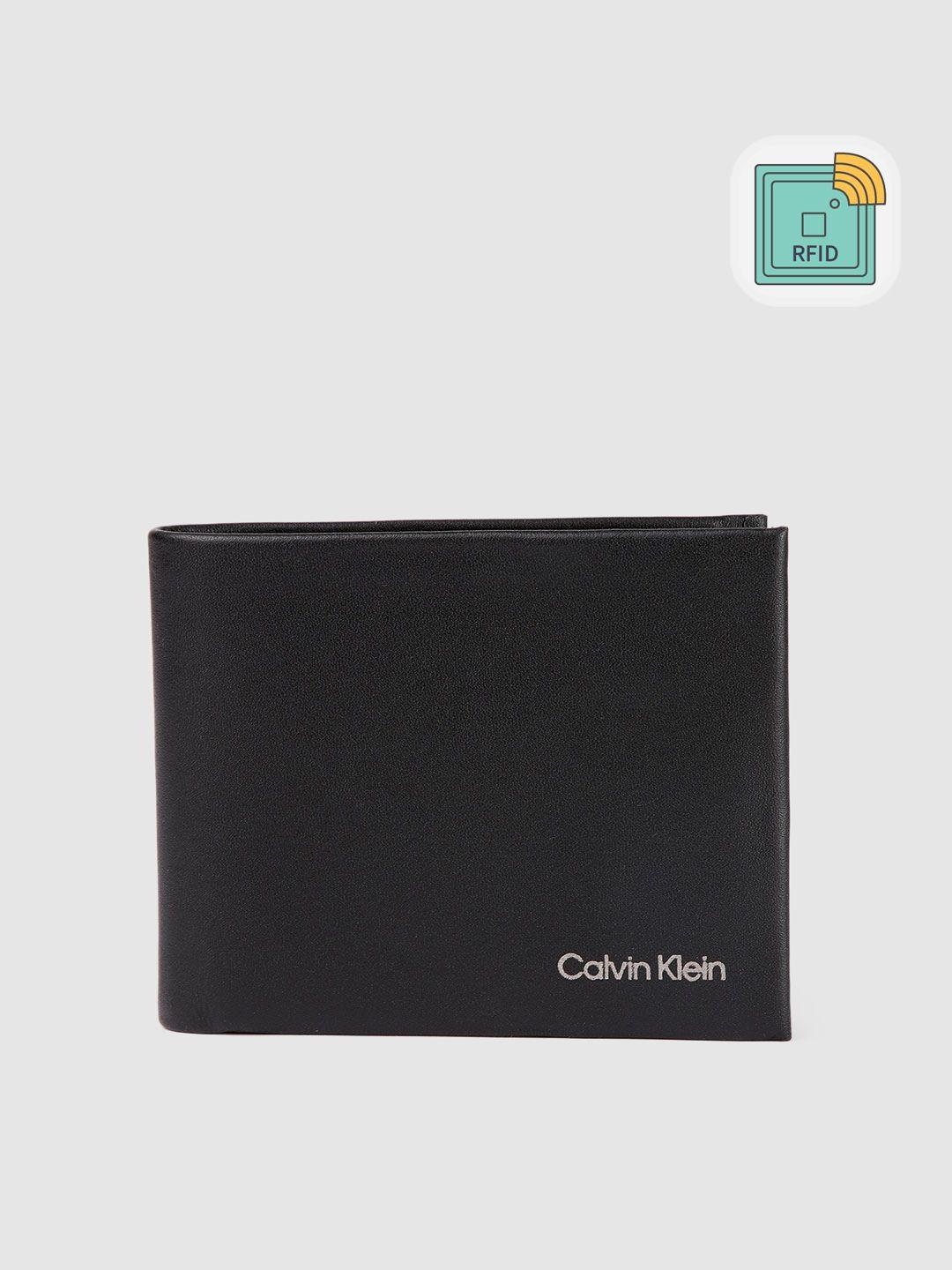 calvin klein men solid leather two fold wallet with rfid protection