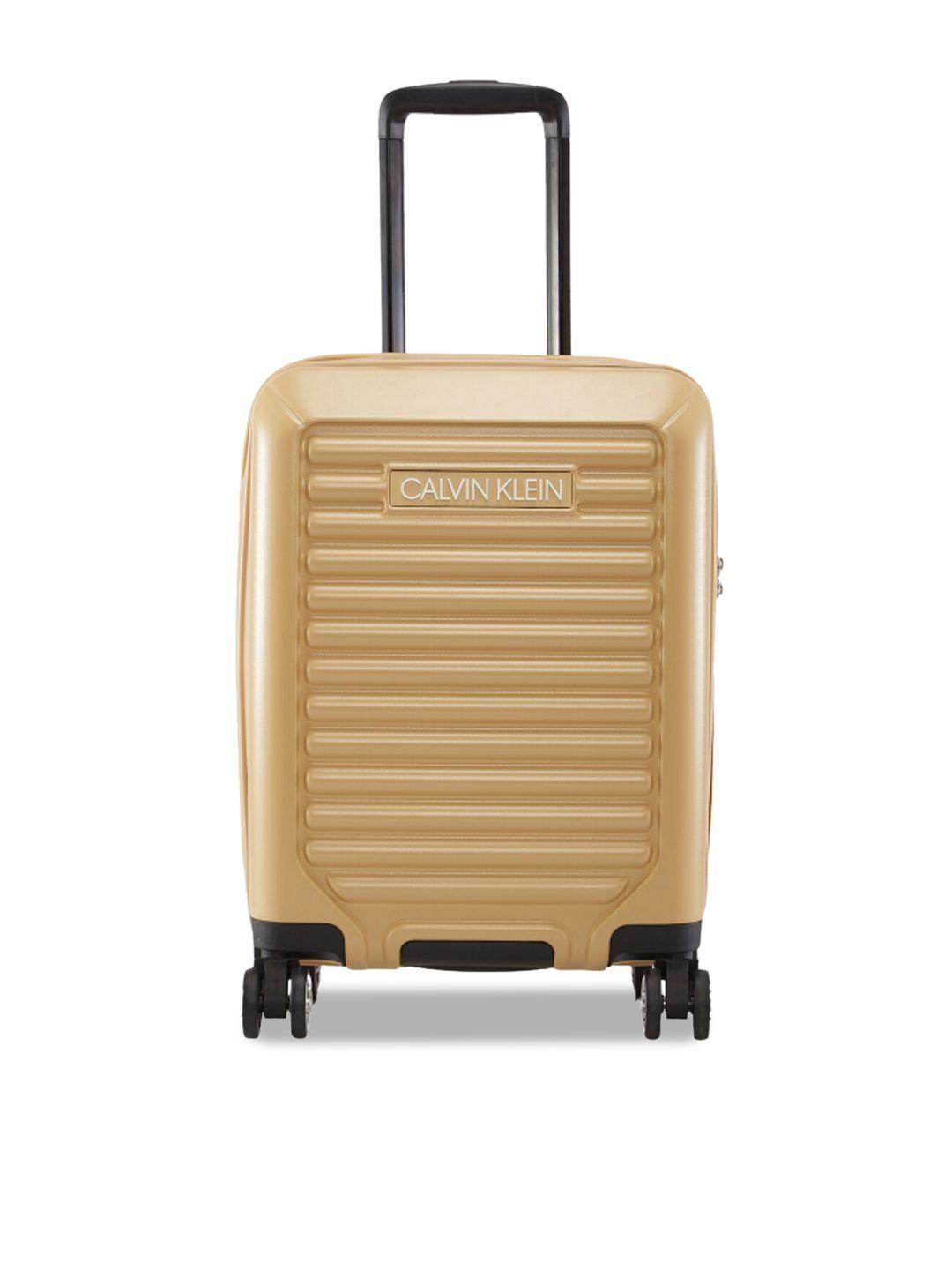 calvin klein odyssey textured abs hard-sided 20" cabin trolley bag