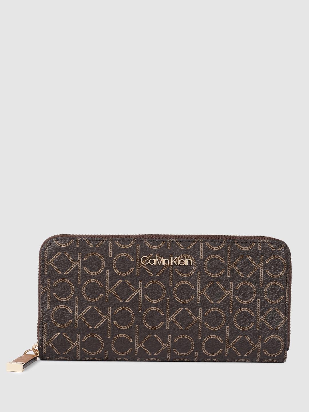 calvin klein women brand logo print & textured pu zip around wallet