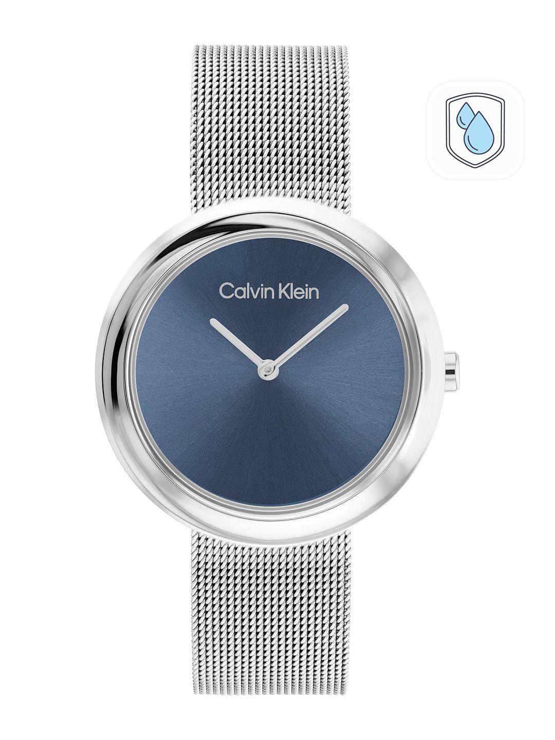 calvin klein women twisted bezel bracelet style analogue watch 25200014-blue