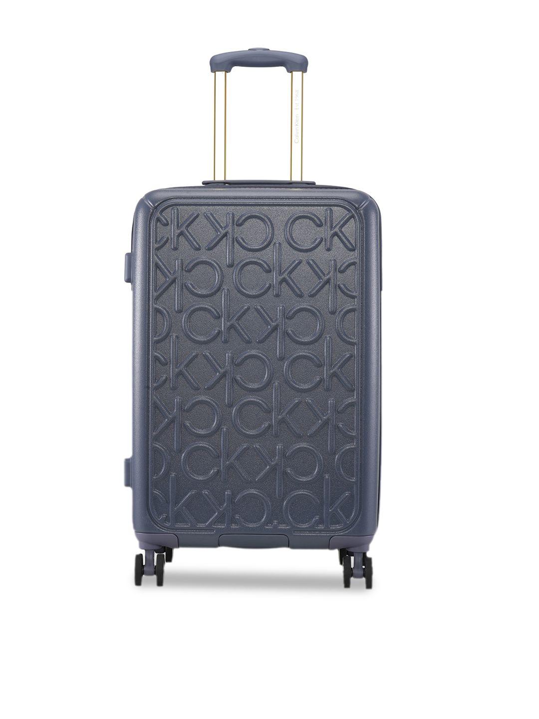 calvin klein big monogram textured abs hard-sided medium trolley suitcase