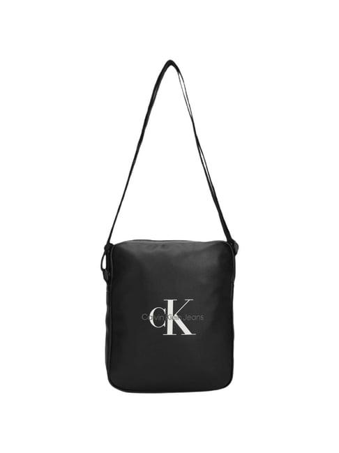 calvin klein black reporter soft medium cross body bag