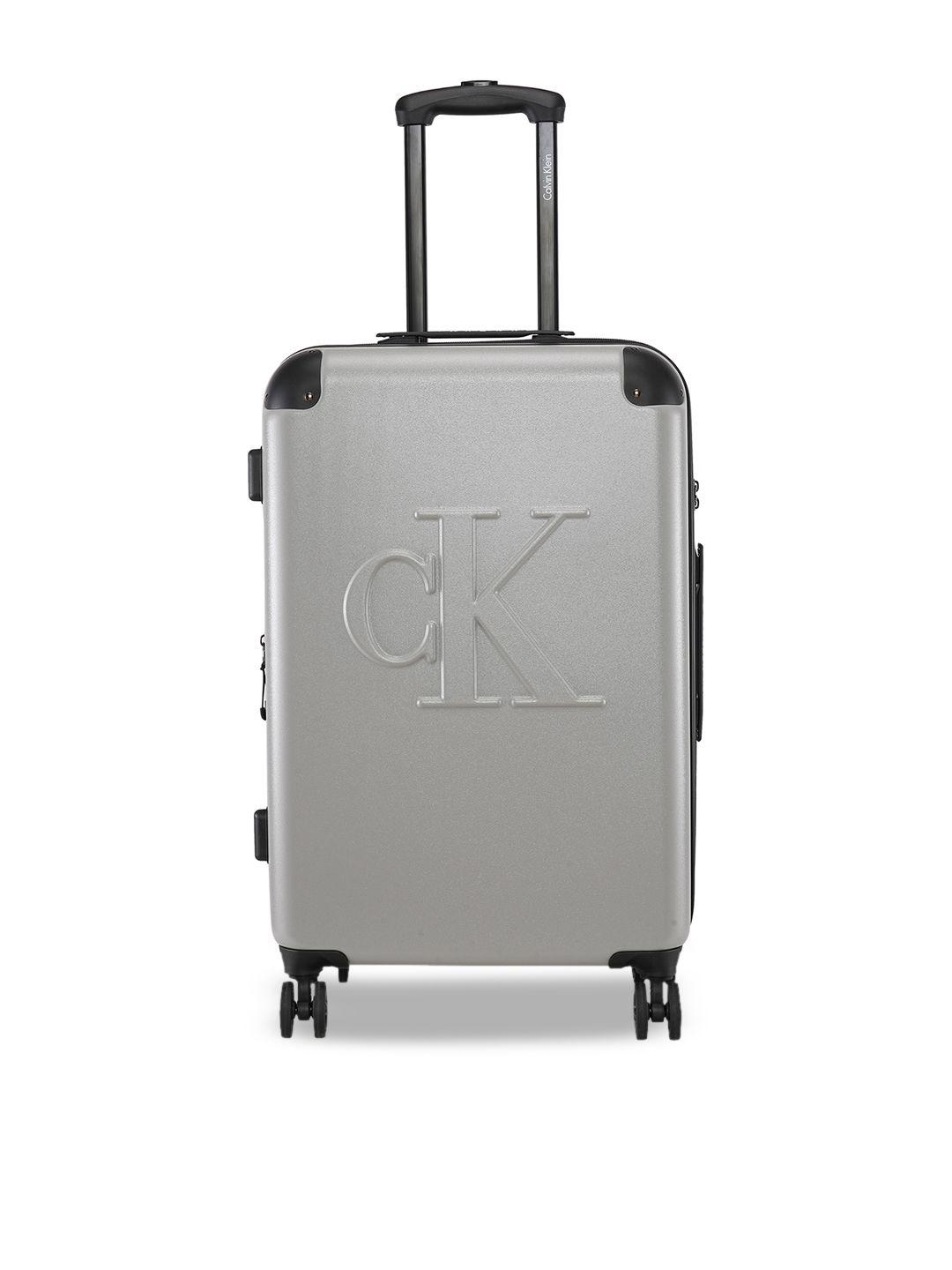 calvin klein brand logo textured hard-sided medium trolley bag