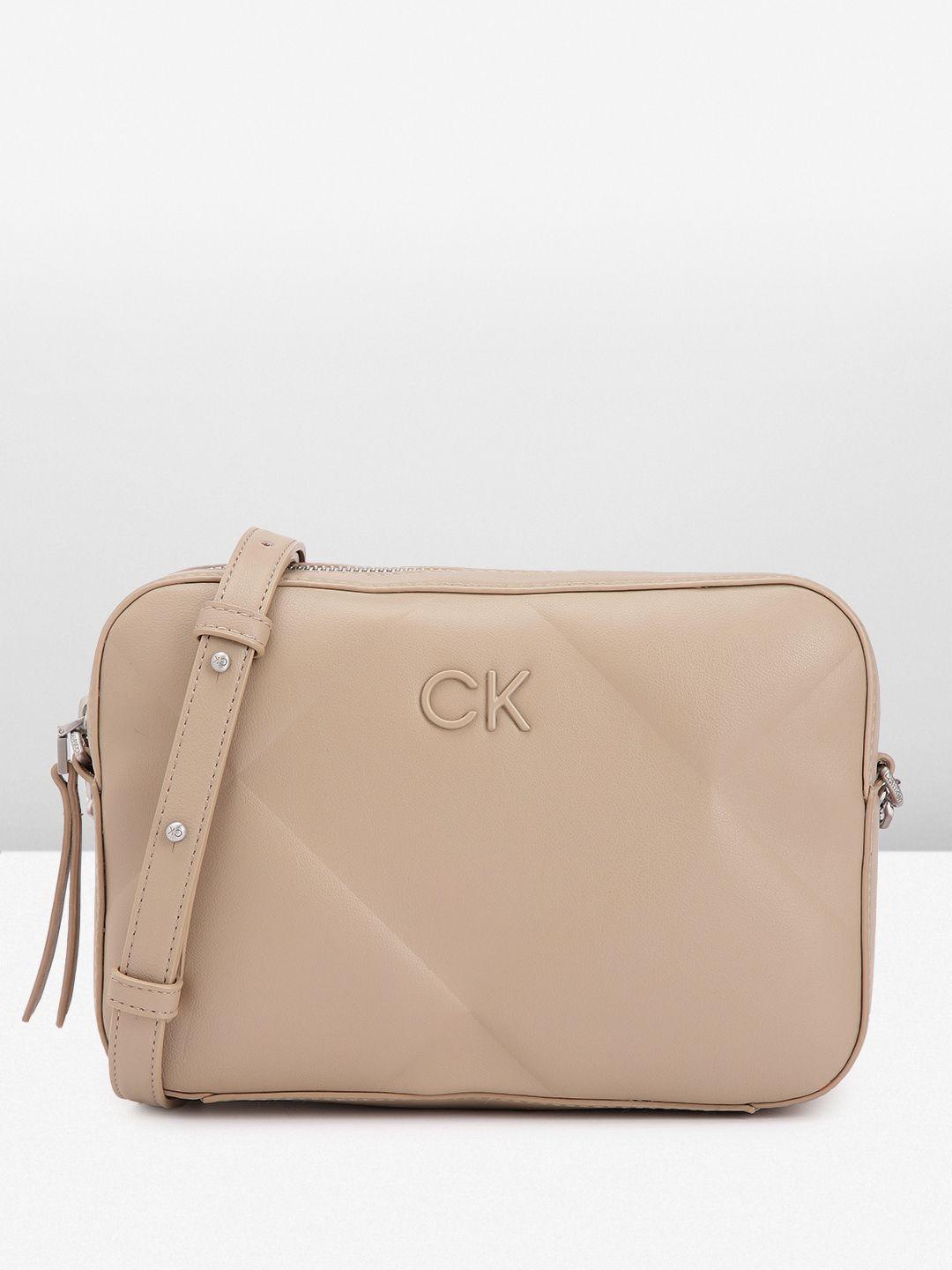 calvin klein geometric design structured sling bag with quilted detail