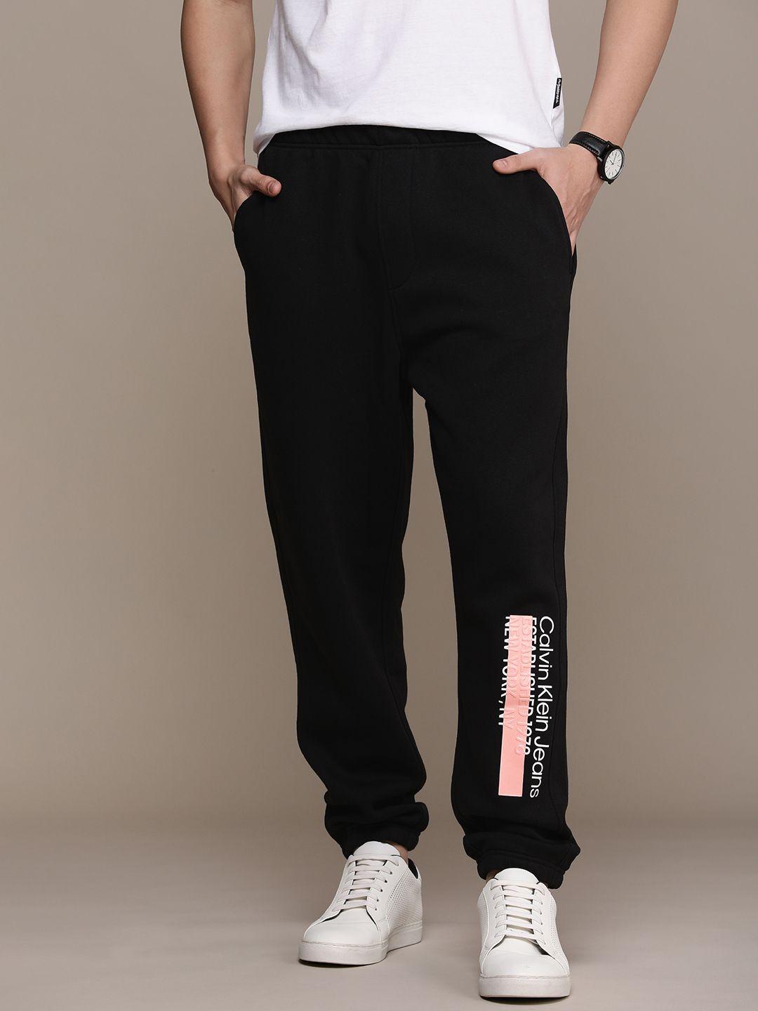 calvin klein jeans men brand logo printed mid-rise relaxed fit joggers track pants
