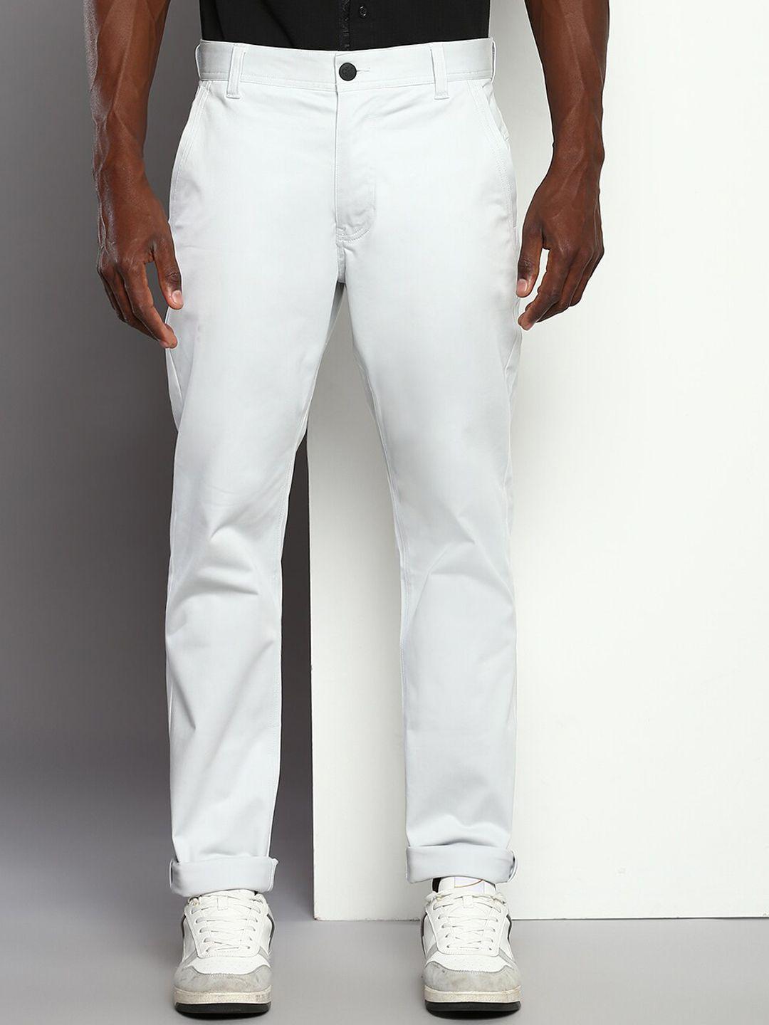 calvin klein jeans men slim fit mid-rise trousers
