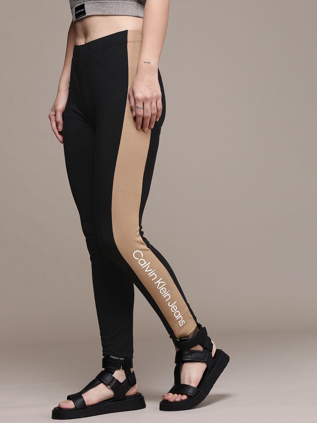calvin klein jeans women black colourblocked leggings with contrast printed side panels