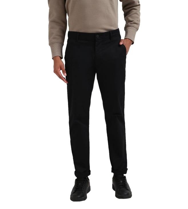 calvin klein men black solid mid-rise tapered fit trouser