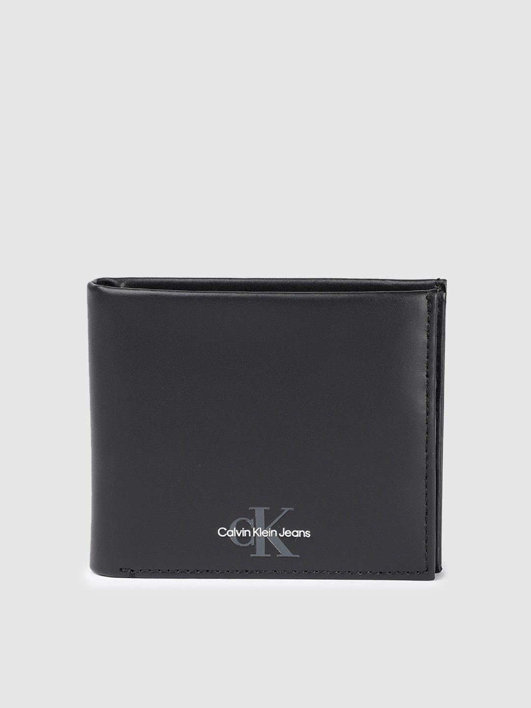 calvin klein men solid leather two fold wallet with minimal brand logo print detail