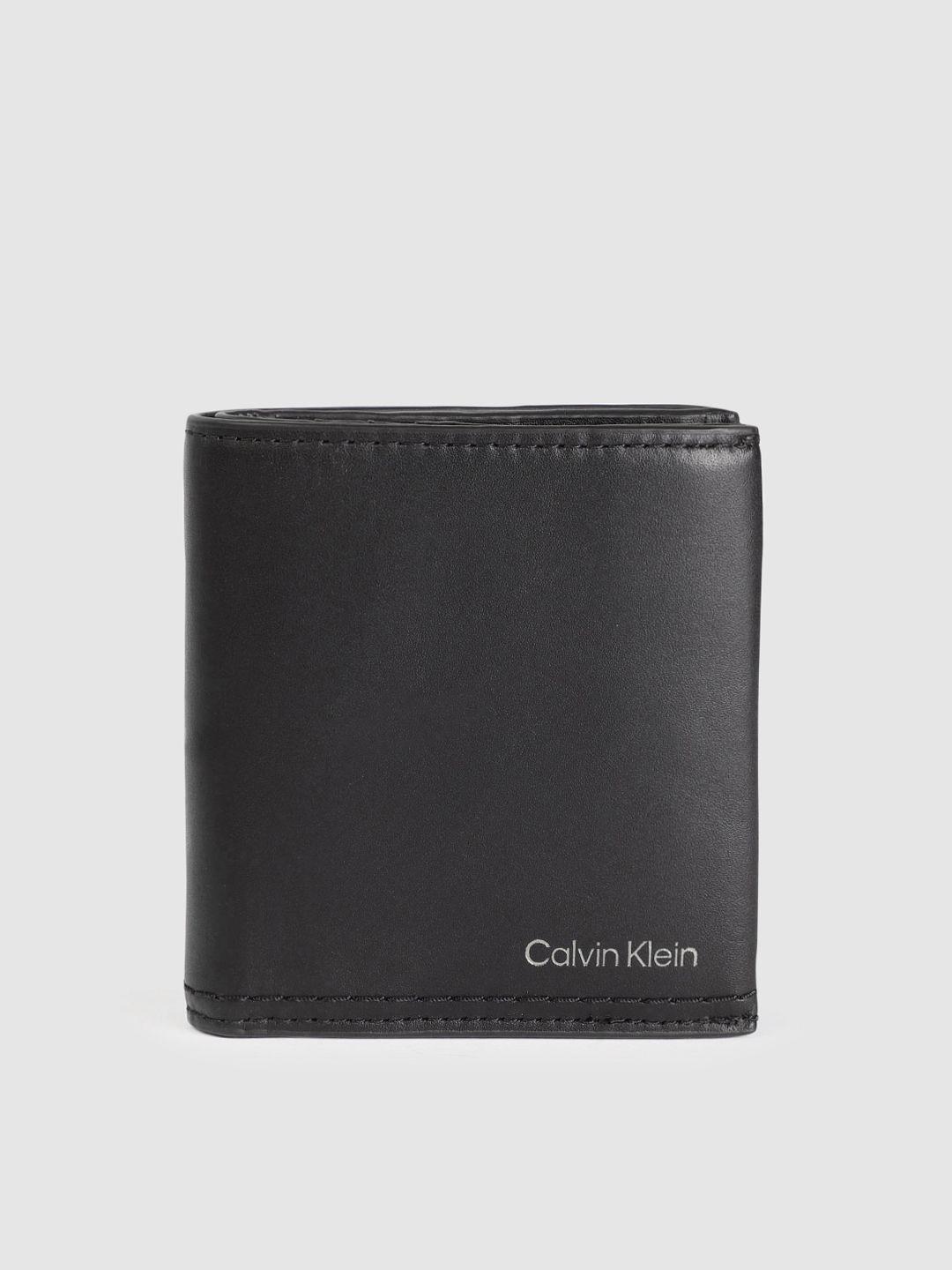 calvin klein men solid leather two fold wallet with rfid