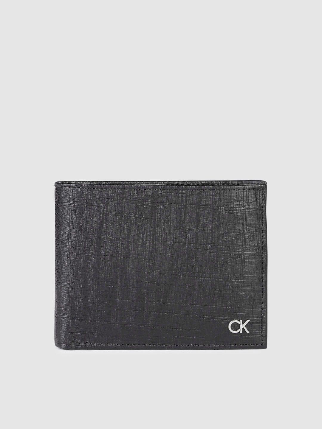 calvin klein men textured leather two fold wallet