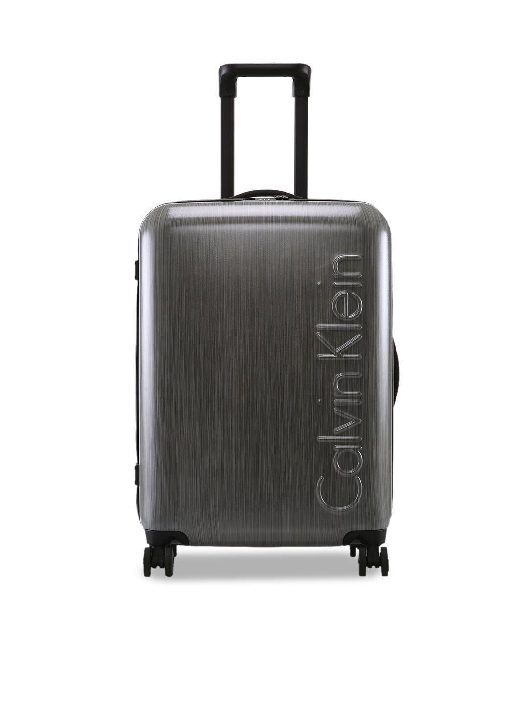 calvin klein southampton hard-sided 360-degree rotation medium trolley suitcase